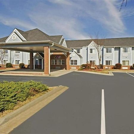 America'S Best Value Inn & Suites-Мак-Доно Экстерьер фото