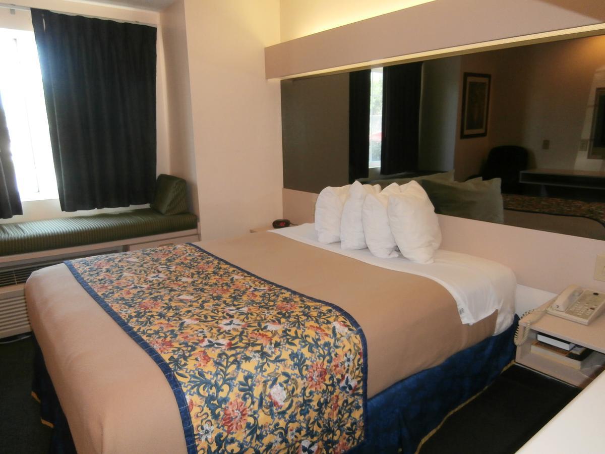 America'S Best Value Inn & Suites-Мак-Доно Экстерьер фото